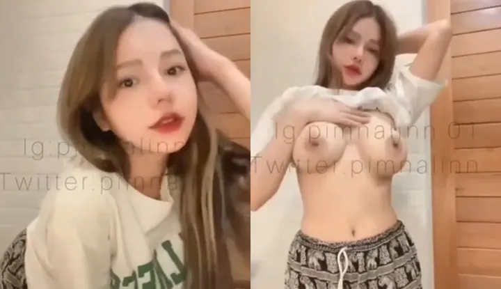 The large breasts of the girl in Thailand are irresistible to the eyes.